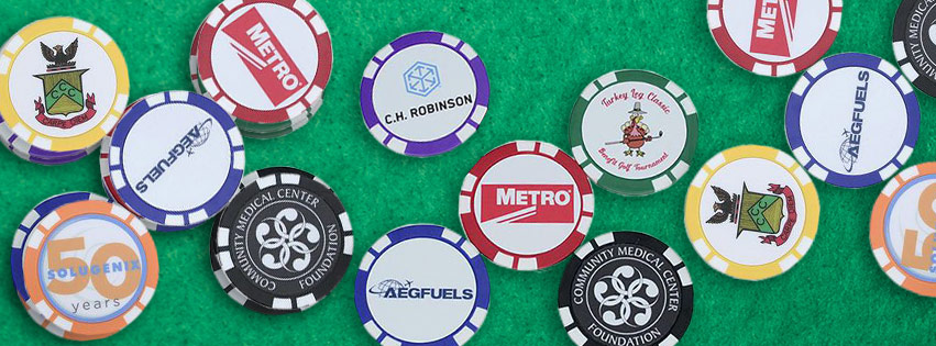 custom personalized poker chips on green poker table