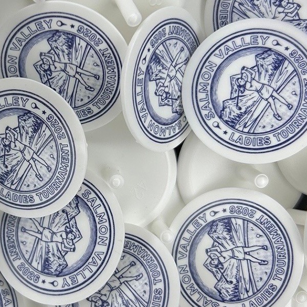 Personalized golf ball markers featuring a detailed blue golf club design