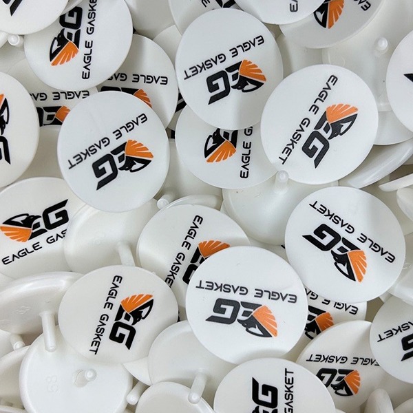 Personalized golf markers printed with company branding