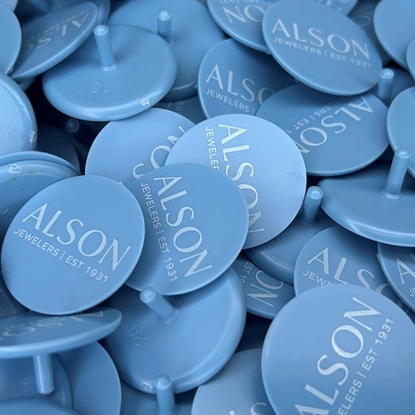 Blue Personalized golf markers printed with company branding