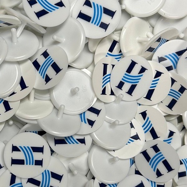 Branded golf markers printed with company branding