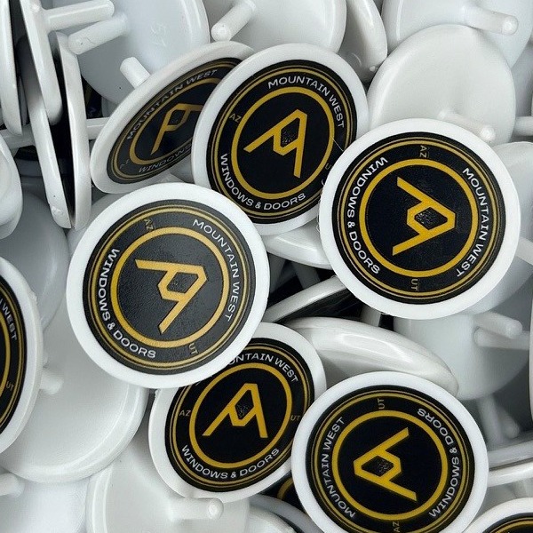 Bulk golf markers printed with company branding