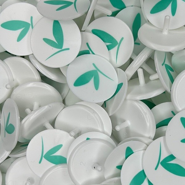 Custom golf markers printed with company branding