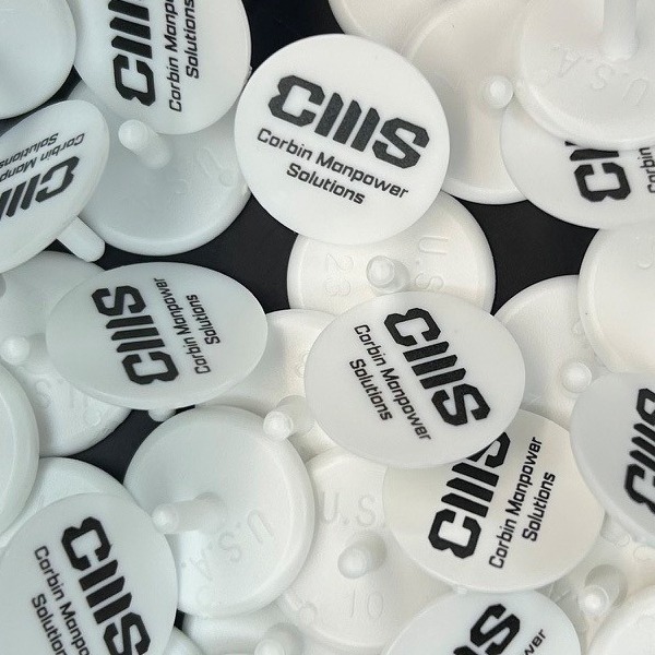 Custom ball markers printed with company branding