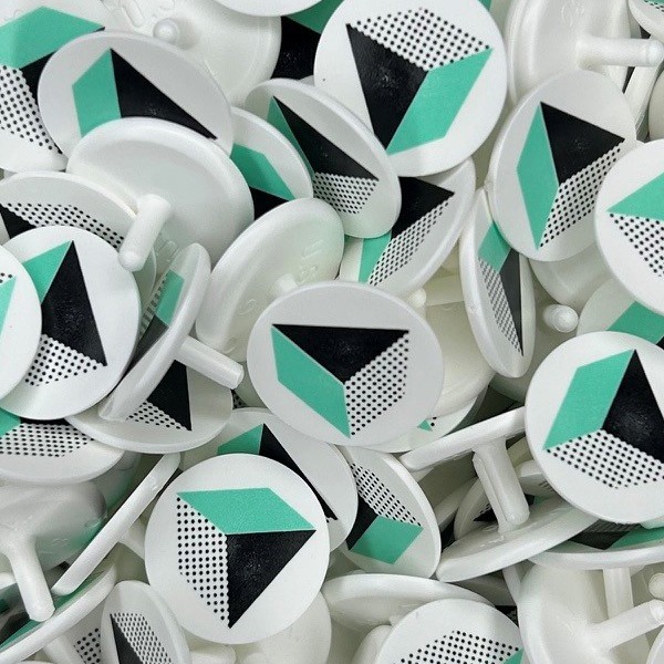 Custom ball markers printed with company branding