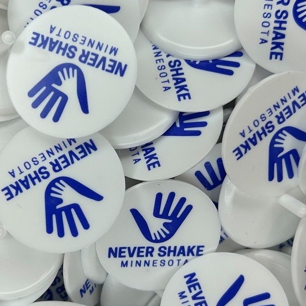 White custom ball markers printed with a blue hand logo
