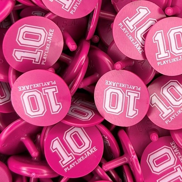 Pink personalized golf markers printed with a white number 10