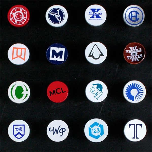 Custom logo golf tees showcasing assorted cup imprint designs