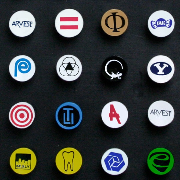 Personalized cup-imprinted golf tees featuring assorted custom branding