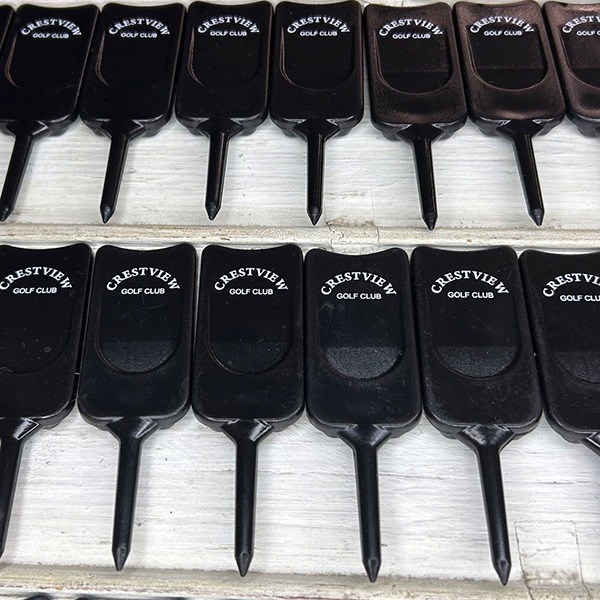 Black Bulk divot repair tools printed with company branding 
