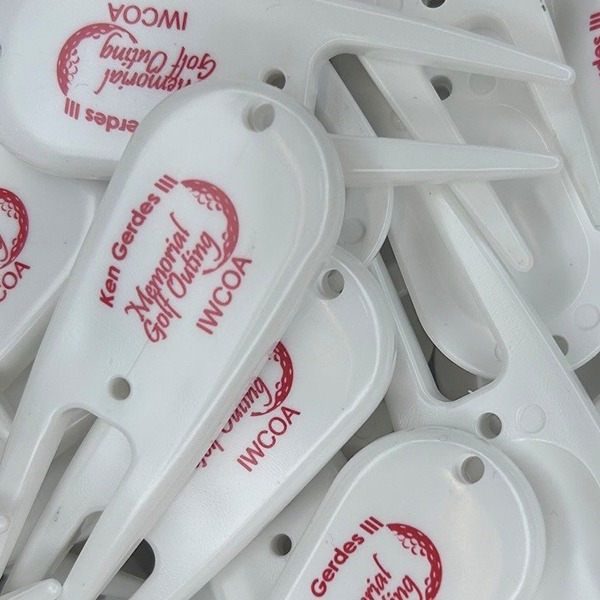Bulk divot repair tools printed with a memorial celebration logo 
