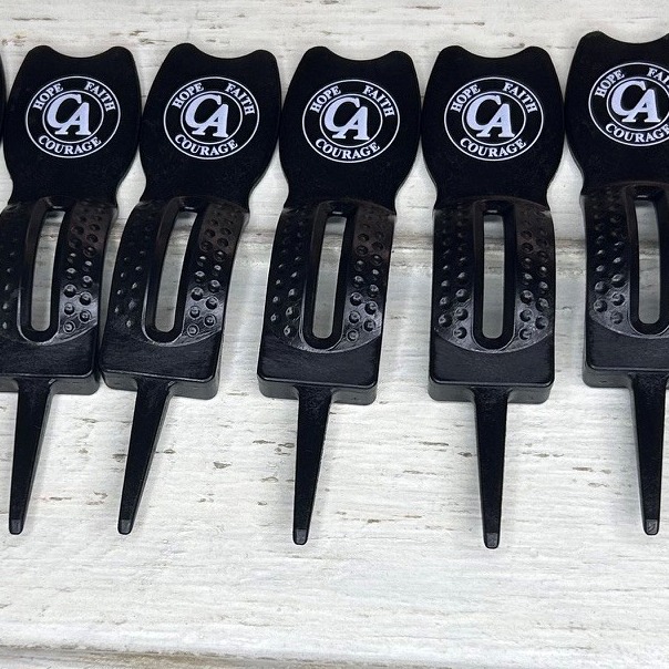 Black Bulk divot repair tools printed with company branding 