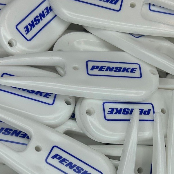 Personalized divot repair tools printed with company branding 