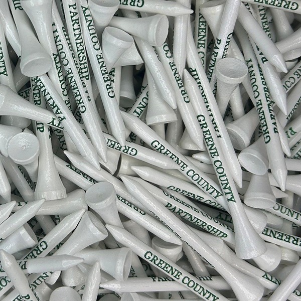 White golf tees printed with green lettering for a county event