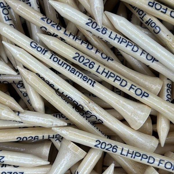 Natural wood golf tees printed for a 2026 golf tournament