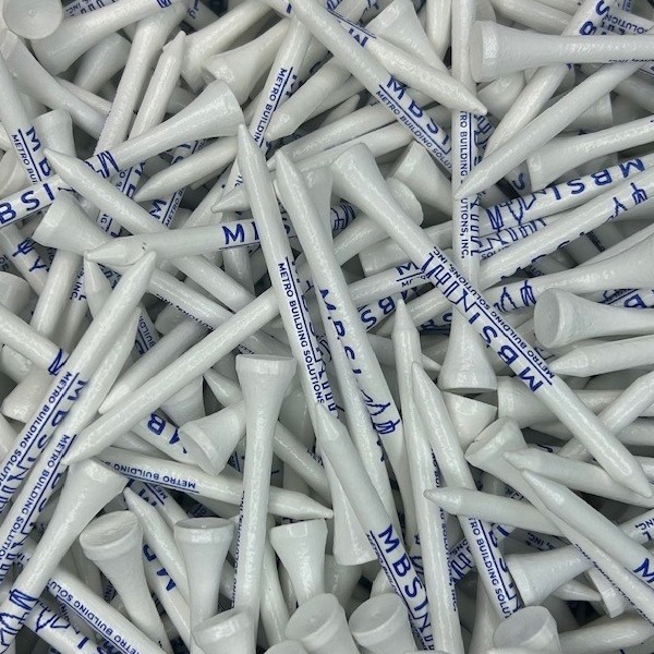 White bulk golf tees printed with gray-blue lettering