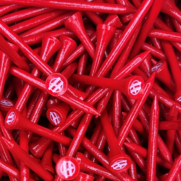 Red custom golf tees with a white cup imprinted logo