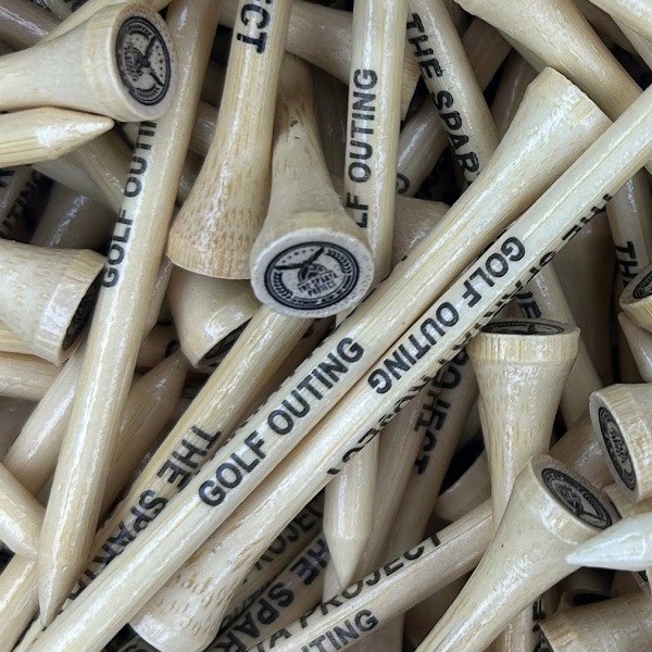 Natural wood golf tees printed for a golf outing with a cup logo