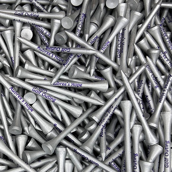 Silver personalized golf tees printed with purple custom lettering