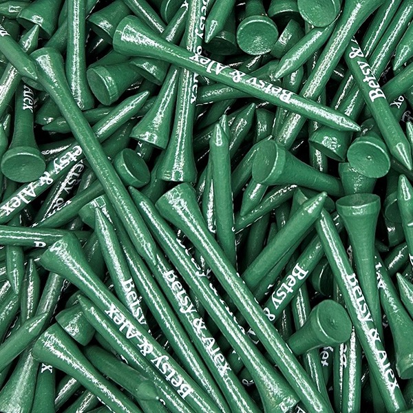 Green branded golf tees printed with white custom lettering