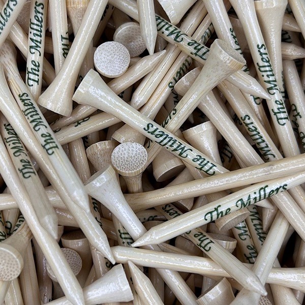 Wooden branded logo golf tees printed with a last name