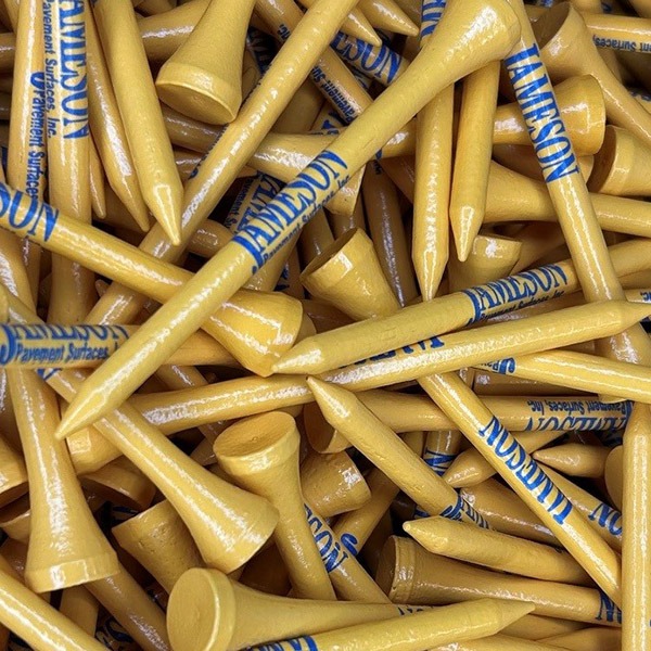 Yellow personalized golf tees printed with company branding