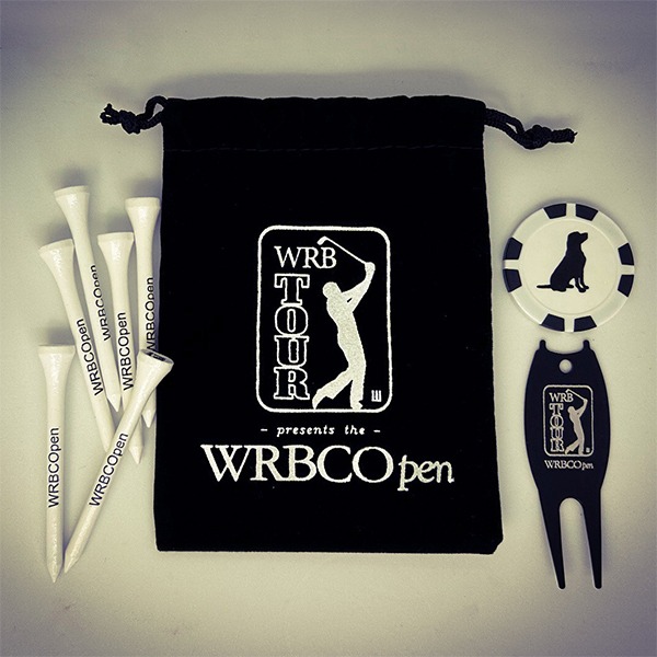 Golf tournament gift pack with drawstring bag, tees, and ball marker