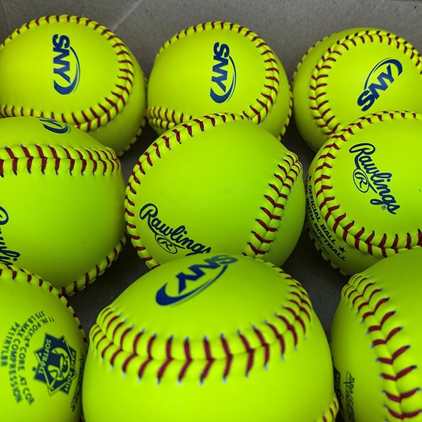 Yellow Rawlings softballs printed with a custom logo