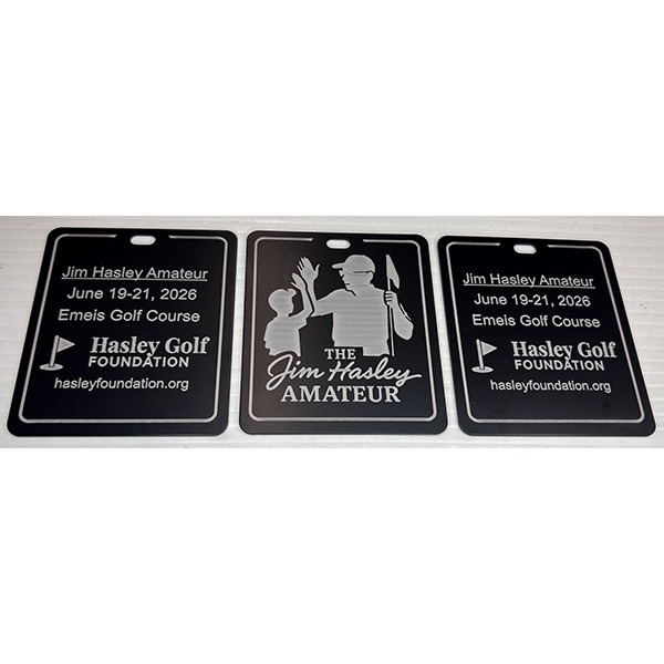 Black personalized golf bag tags engraved with tournament details