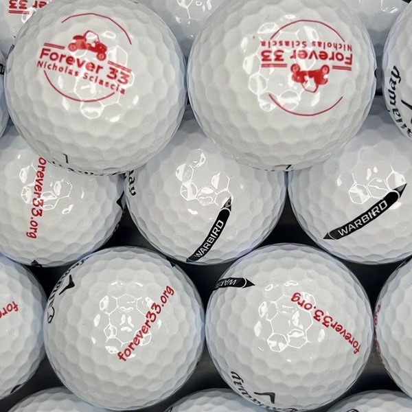 Custom tournament golf balls printed with an event logo