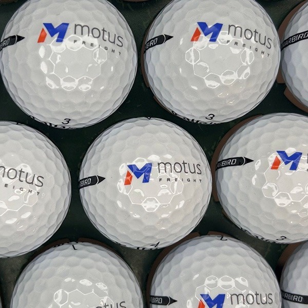 Custom golf balls printed with corporate logos