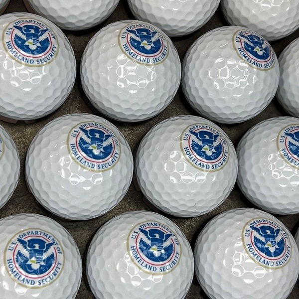 Custom golf balls printed with a government agency seal