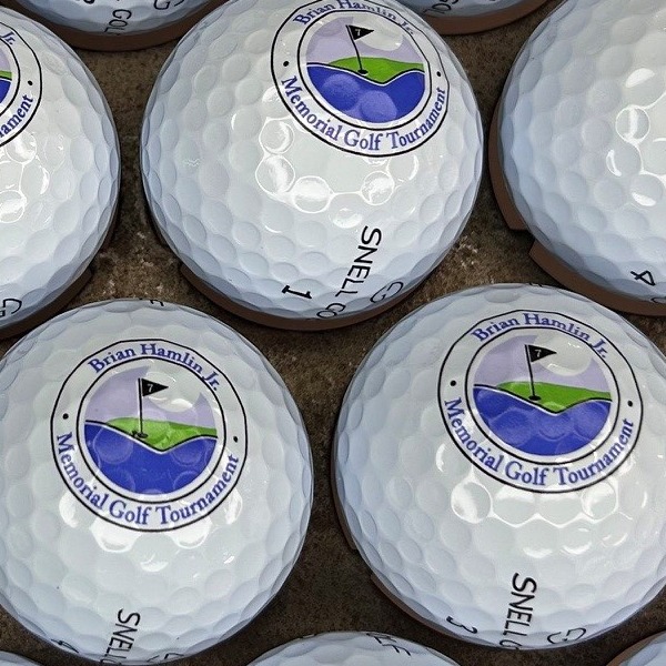 Custom memorial golf balls printed for an annual golf tournament