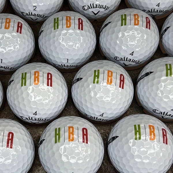 Callaway custom golf balls featuring multicolor letter branding