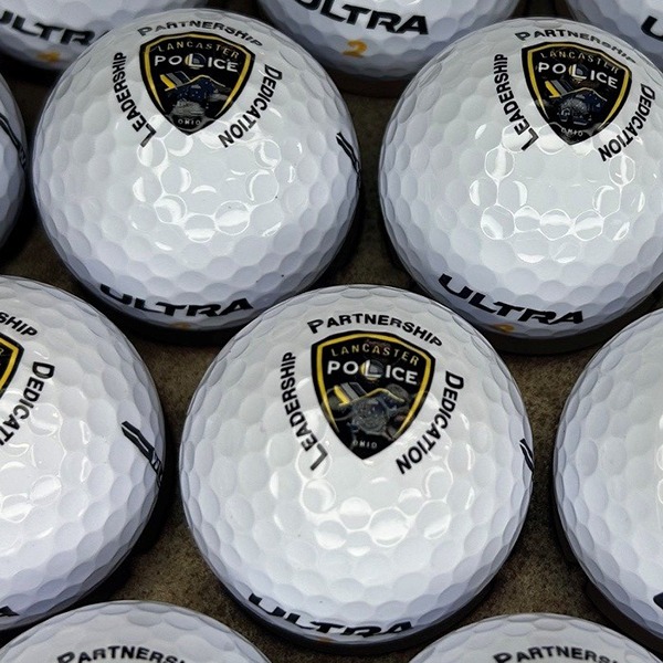Ultra custom golf balls printed with a police event logo