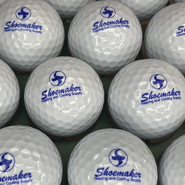 Custom logo golf balls featuring blue company branding