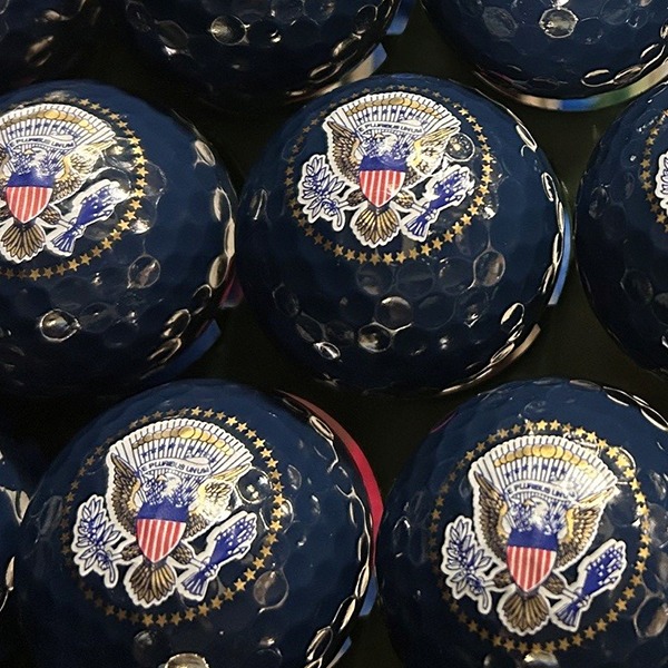 Navy custom golf balls printed with the U.S. presidential seal