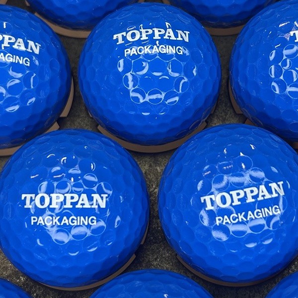 Blue custom golf balls printed with a white corporate logo