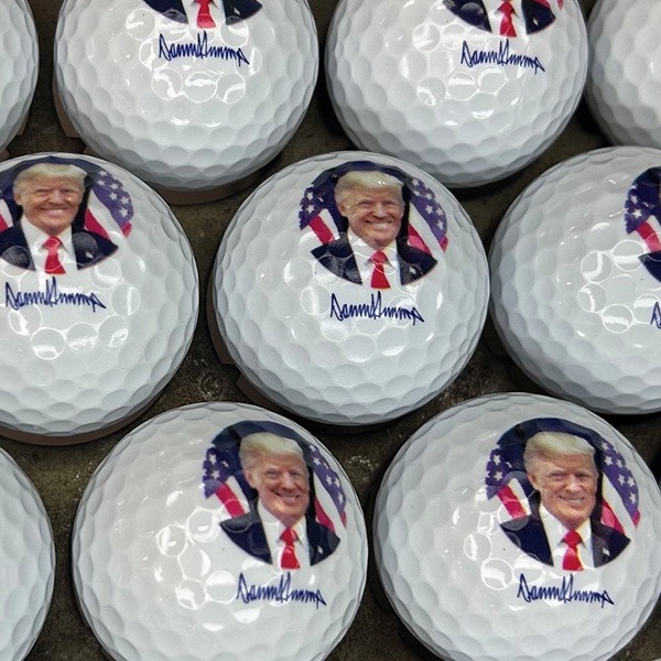 Personalized golf balls featuring a custom political portrait design