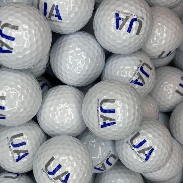 Custom golf balls printed with a simple blue and red logo