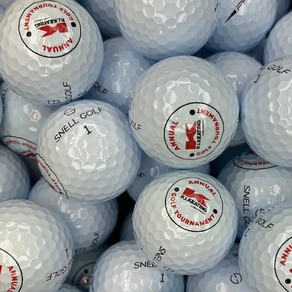 Snell custom golf balls printed with a circular event logo