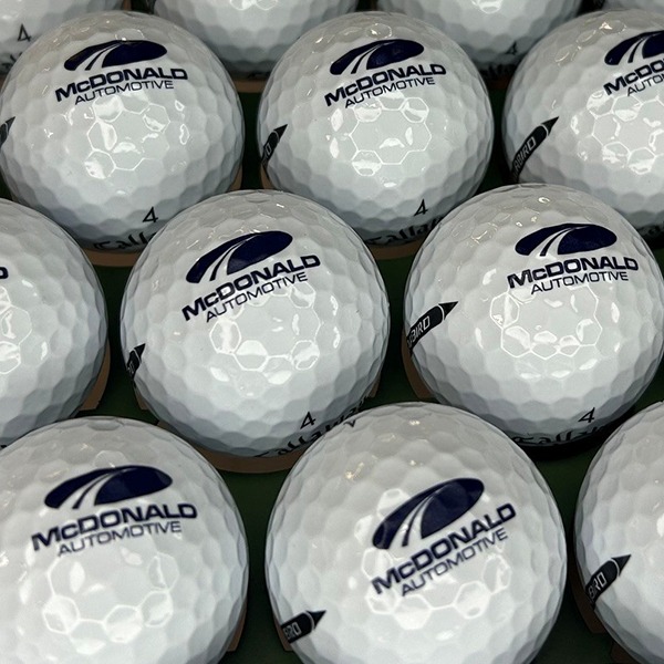 Custom logo golf balls printed with black company branding