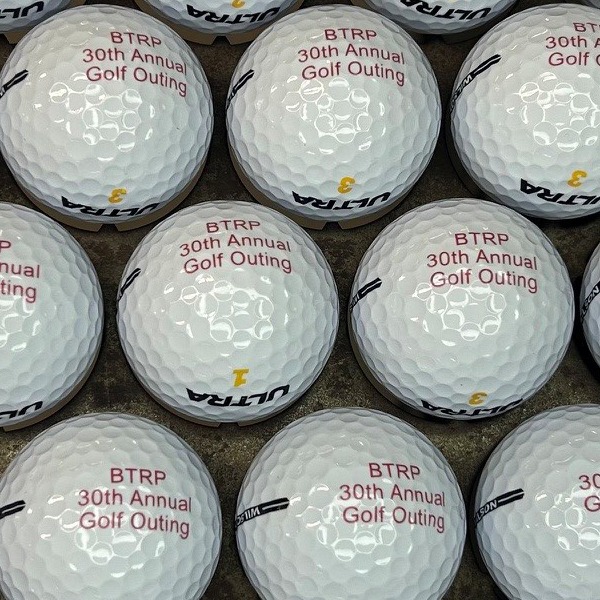 Personalized golf balls printed for a 30th annual golf outing