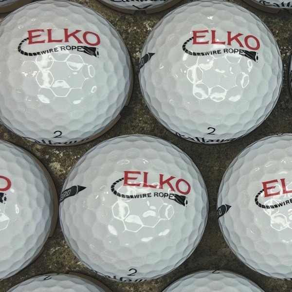 Custom logo golf balls featuring red company branding