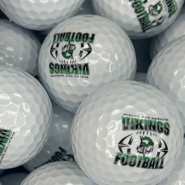 Custom golf balls printed with a football-themed event design