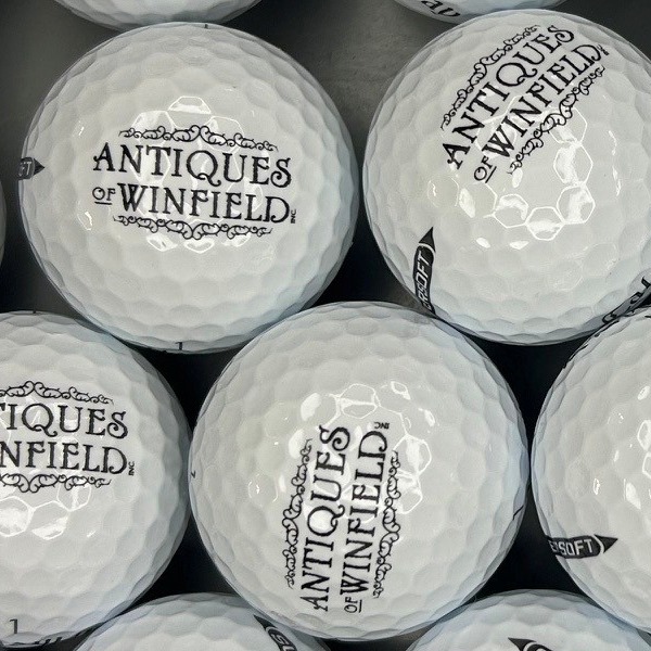 Logo golf balls printed with custom black business branding