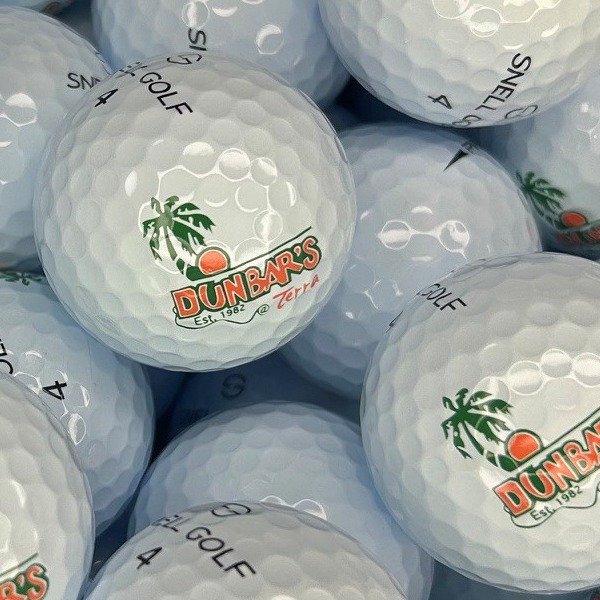 Snell custom golf balls printed with a full-color palm tree logo