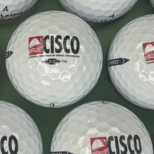 White branded golf balls printed with a red and black company logo