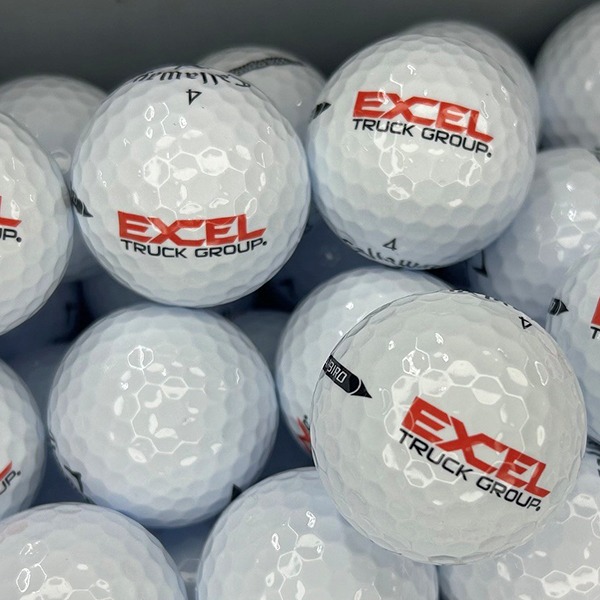 White custom golf balls printed with a red trucking company logo