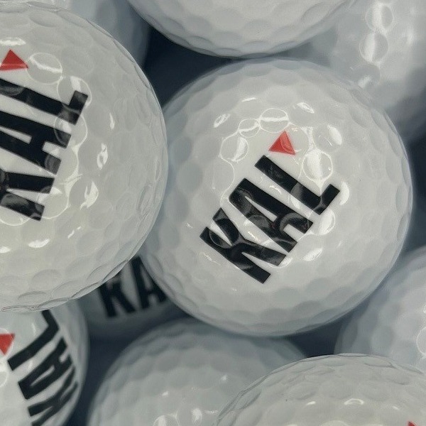 White custom golf balls printed with large black letters